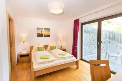 Ein Bett oder Betten in einem Zimmer der Unterkunft Feriendomizil zeitGenuss