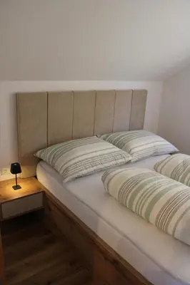 Ein Bett oder Betten in einem Zimmer der Unterkunft Panorama Loft Bad Aussee