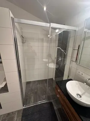 Ein Badezimmer in der Unterkunft Leos Suite Appartement