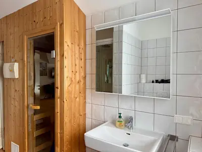 Ein Badezimmer in der Unterkunft Gipfelruhe-ganzes Ferienhaus mit Sauna, Garten & Spielzimmer- Ramsau am Dachstein
