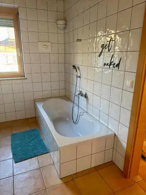 Ein Badezimmer in der Unterkunft Gipfelruhe-ganzes Ferienhaus mit Sauna, Garten & Spielzimmer- Ramsau am Dachstein