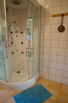 Ein Badezimmer in der Unterkunft Gipfelruhe-ganzes Ferienhaus mit Sauna, Garten & Spielzimmer- Ramsau am Dachstein