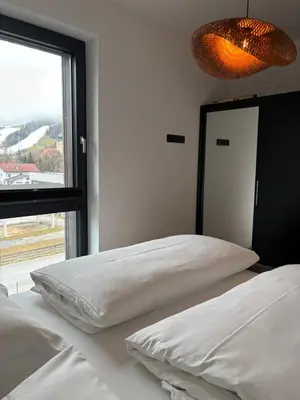 Ein Bett oder Betten in einem Zimmer der Unterkunft Appartement GLÜCKSVOGEL