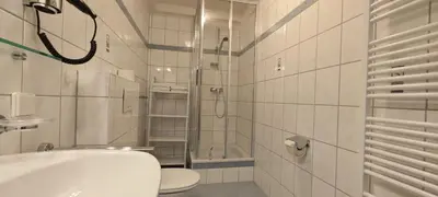 Ein Badezimmer in der Unterkunft Haus Adler