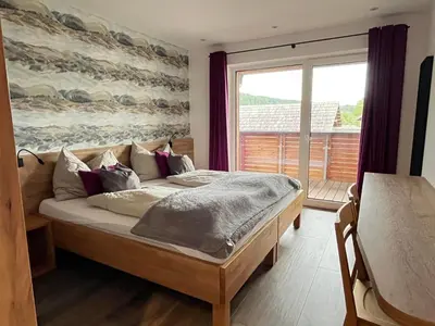 Ein Bett oder Betten in einem Zimmer der Unterkunft Appartementhaus Longa Stubn