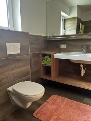 Ein Badezimmer in der Unterkunft Appartementhaus Longa Stubn