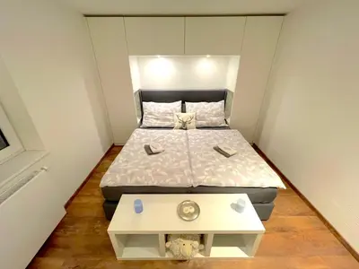 Ein Bett oder Betten in einem Zimmer der Unterkunft Stoltzis Appartement