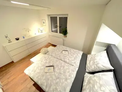 Ein Bett oder Betten in einem Zimmer der Unterkunft Stoltzis Appartement