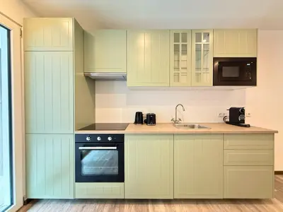 Küche/Küchenzeile in der Unterkunft Treehouse - Alpinlake Apartments