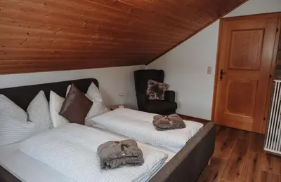 Ein Bett oder Betten in einem Zimmer der Unterkunft Hohlbichlgut