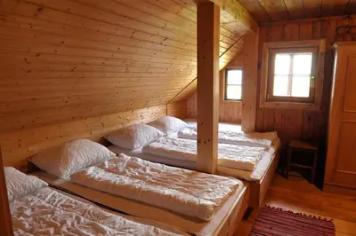 Ein Bett oder Betten in einem Zimmer der Unterkunft Hoamatlhütte