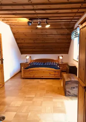 Ein Bett oder Betten in einem Zimmer der Unterkunft Hochsteinalm