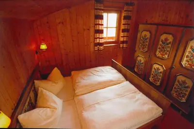 Ein Bett oder Betten in einem Zimmer der Unterkunft Vordergottschallalm