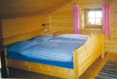 Ein Bett oder Betten in einem Zimmer der Unterkunft Maierlehenalm