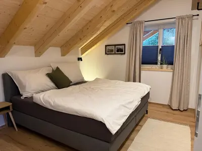 Ein Bett oder Betten in einem Zimmer der Unterkunft amKampl-Ferienwohnung