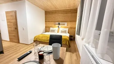 Ein Bett oder Betten in einem Zimmer der Unterkunft Timber Studio - Schladming