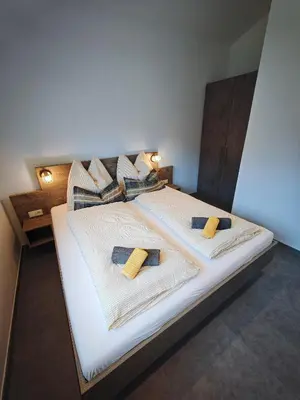 Ein Bett oder Betten in einem Zimmer der Unterkunft HausTipTop