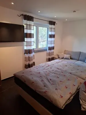 Ein Bett oder Betten in einem Zimmer der Unterkunft Chalet Ausweger - Strobl am Wolfgangsee