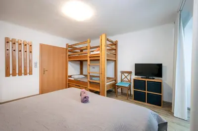 Ein Bett oder Betten in einem Zimmer der Unterkunft Apartment AUTHORIA