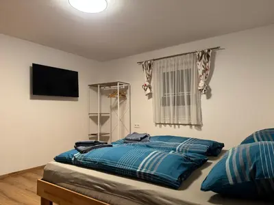 Ein Bett oder Betten in einem Zimmer der Unterkunft Ski und Wander Ferienhäuser Galsterberg-Blick Pruggern - Schladming-Dachstein
