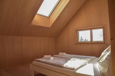 Ein Bett oder Betten in einem Zimmer der Unterkunft Z91 - Skandi-Architektenhaus mit Bergblick