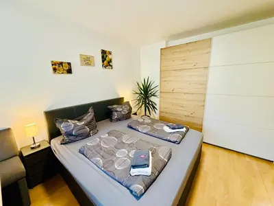Ein Bett oder Betten in einem Zimmer der Unterkunft Apartment Postalm nahe Zentrum