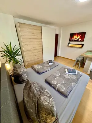 Ein Bett oder Betten in einem Zimmer der Unterkunft Apartment Postalm nahe Zentrum