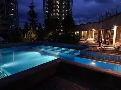 Der Swimmingpool an oder in der Nähe von Residence Deluxe, 3BR, Balcony, Spa,Ski in-Ski out