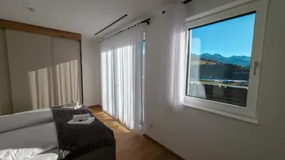 Ein Sitzbereich in der Unterkunft Alpen Sky Apartments
