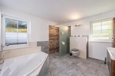 Ein Badezimmer in der Unterkunft Haus Köll - by myNests
