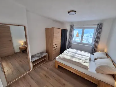 Ein Bett oder Betten in einem Zimmer der Unterkunft Ferienwohnung Peham