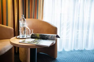 Ein Sitzbereich in der Unterkunft EVIVA im Parkhotel