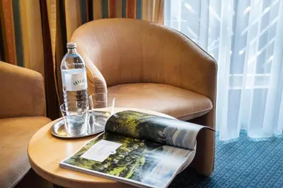 Ein Sitzbereich in der Unterkunft EVIVA im Parkhotel