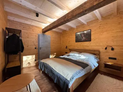Ein Bett oder Betten in einem Zimmer der Unterkunft LostGarden Apartments