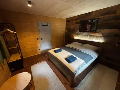 Ein Bett oder Betten in einem Zimmer der Unterkunft LostGarden Apartments