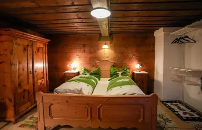Ein Bett oder Betten in einem Zimmer der Unterkunft Haus Hainschneider - Zentrum Tauplitz - by myNests