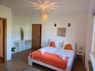 Ein Bett oder Betten in einem Zimmer der Unterkunft Ferienwohnung Walcher