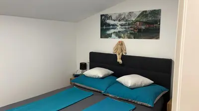 Ein Bett oder Betten in einem Zimmer der Unterkunft Traunsee Appartement 1