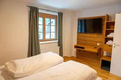 Ein Bett oder Betten in einem Zimmer der Unterkunft Dorfplatzl Loft