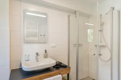 Ein Badezimmer in der Unterkunft Dorfplatzl Suite