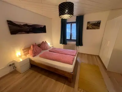 Ein Bett oder Betten in einem Zimmer der Unterkunft Freelife Ferienhaus