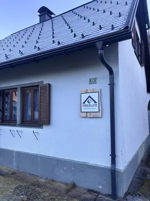 Ein Zertifikat, Auszeichnung, Logo oder anderes Dokument, das in der Unterkunft Freelife Ferienhaus ausgestellt ist