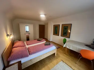 Ein Bett oder Betten in einem Zimmer der Unterkunft Freelife Ferienhaus