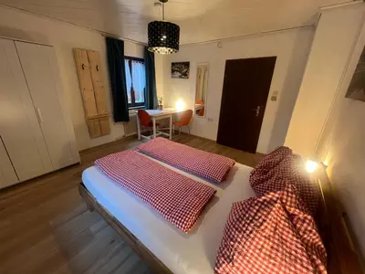 Ein Bett oder Betten in einem Zimmer der Unterkunft Freelife Ferienhaus