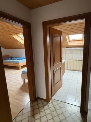 Ein Bett oder Betten in einem Zimmer der Unterkunft Danner Appartements Regau - Möblierte Langzeit- & Monteurapartments nahe Gmunden, Laakirchen, Salzburg & Wels I Vollmöbliert & mit Parkplatz