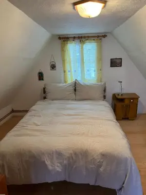 Ein Bett oder Betten in einem Zimmer der Unterkunft Ferienhütte Admont