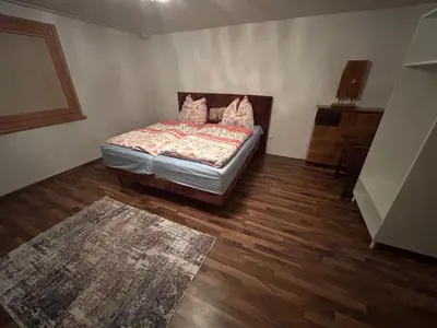 Ein Bett oder Betten in einem Zimmer der Unterkunft Cinthias Sonnseiten Apartments Panoramalage über Altenmarkt, Nähe Therme und Skigebiet