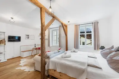 Ein Bett oder Betten in einem Zimmer der Unterkunft City Lofts Bad Aussee by Landluft