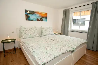 Ein Bett oder Betten in einem Zimmer der Unterkunft Haus Dorfinger