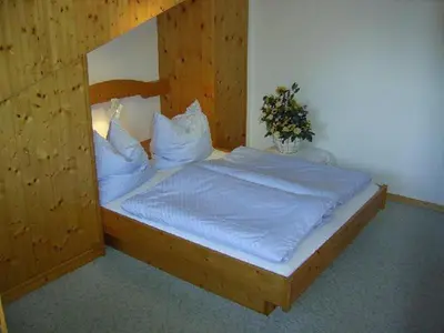 Ein Bett oder Betten in einem Zimmer der Unterkunft Gästehaus Riki Oberschmid